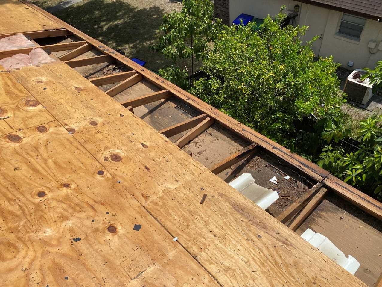 Localized roof deck replacement in progress before dry-in